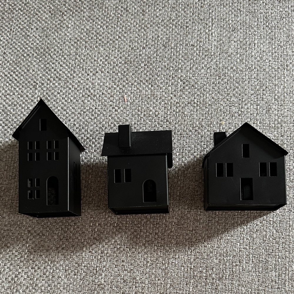 Black metal houses target dollar spot
